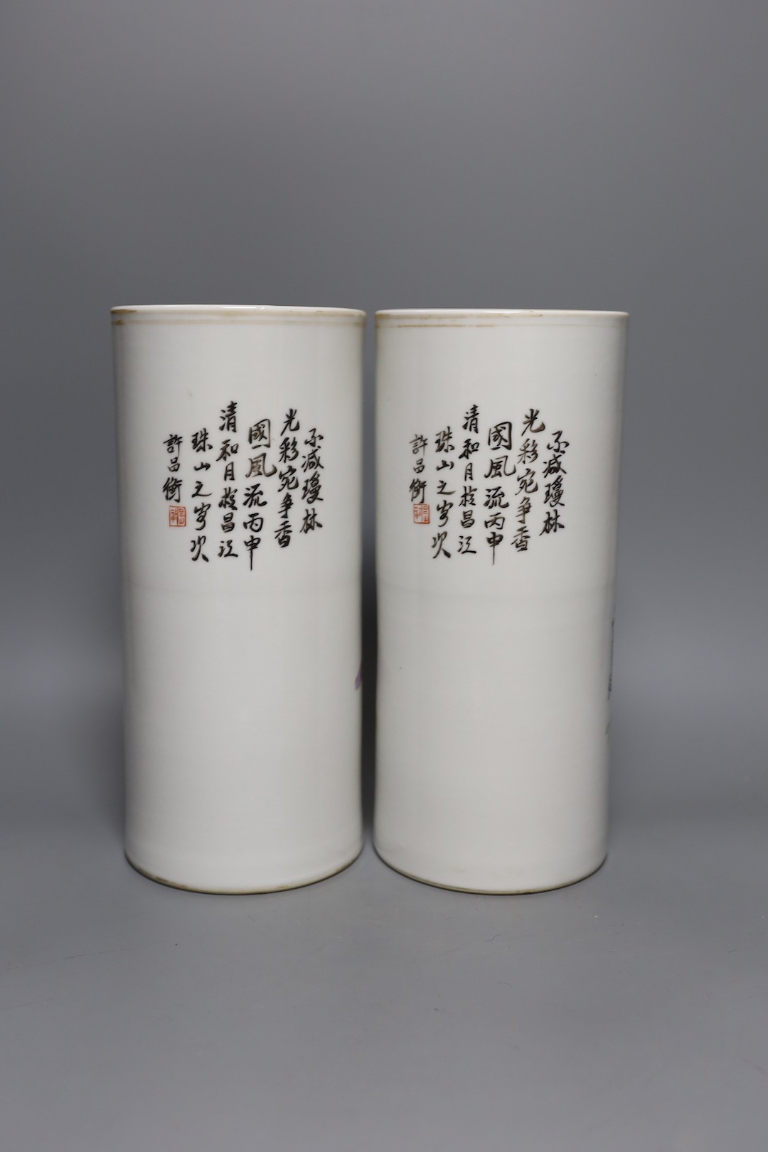 A pair of Chinese famille rose cylindrical vases 27cm